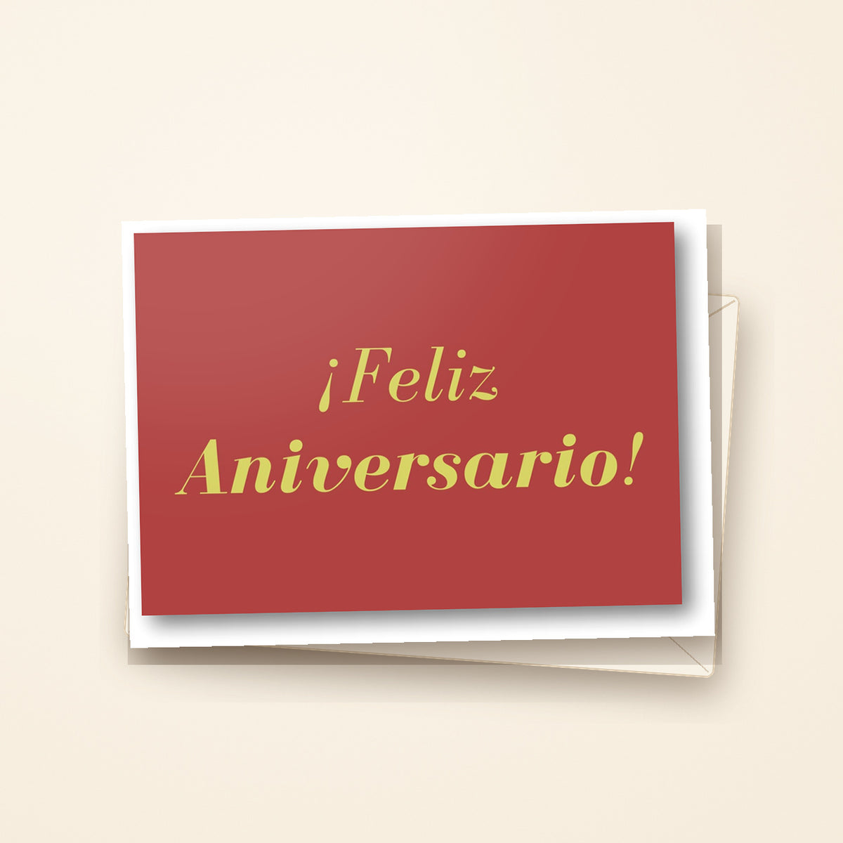 Tarjeta FELIZ ANIVERSARIO presentada con sobre sobre fondo crema